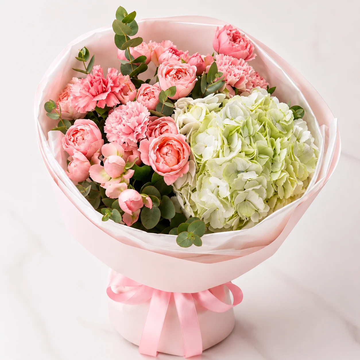 Carnation & Peony Roses with elegant fresh flowers beautifully arranged for luxury gifting